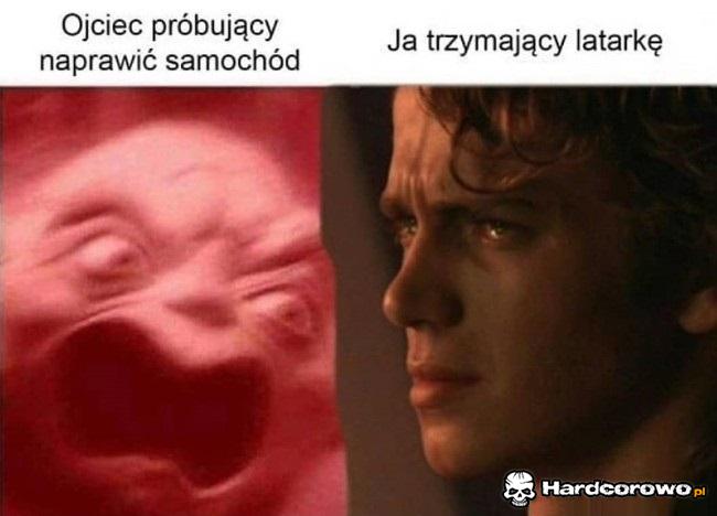 Ojciec próbujący naprawić samochód - 1